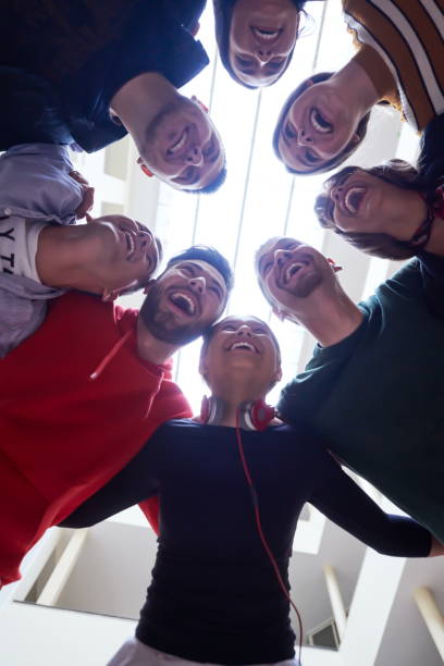 istock group of happy young people showing their unity 1310175179