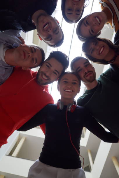 istock group of happy young people showing their unity 1310175685