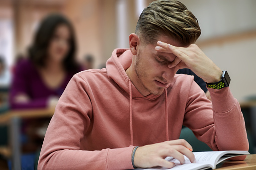 the student has headaches while listening to a math class in college