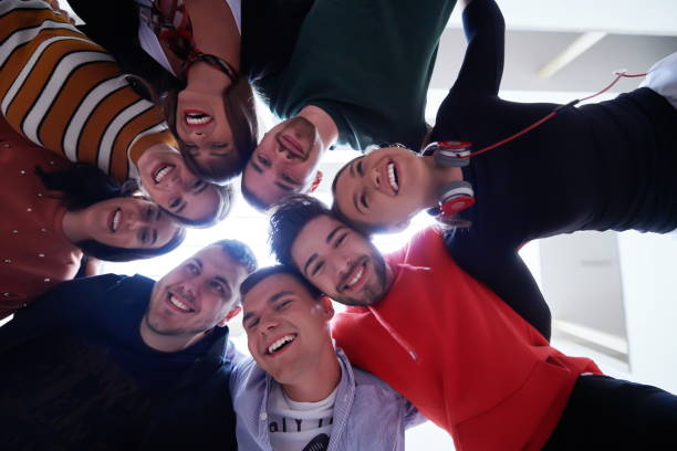 istock group of happy young people showing their unity 1310176564