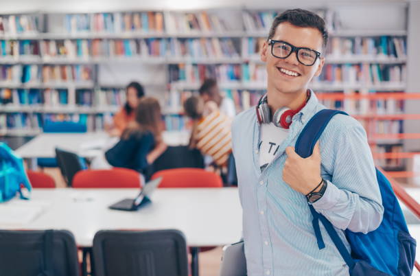 istock the student uses a notebook, latop and a school library 1310179684