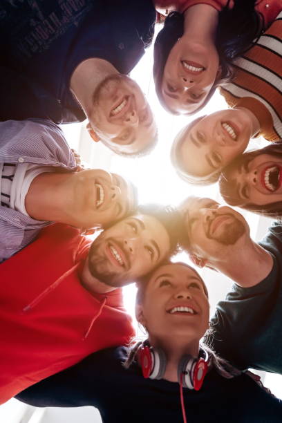 istock group of happy young people showing their unity 1310179755