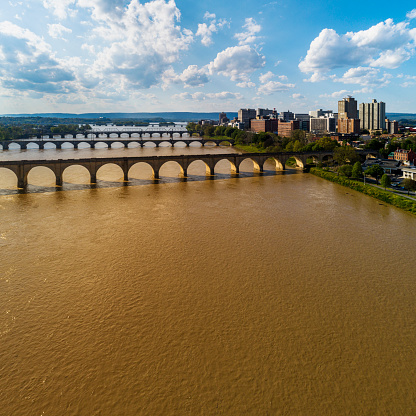 Historic bridges over the Susquehanna River with a remote view on Downtown Harrisburg, Pennsylvania.