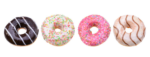 istock glazed doughnuts with bright colored sprinkles,isolated on a white background 1310190500