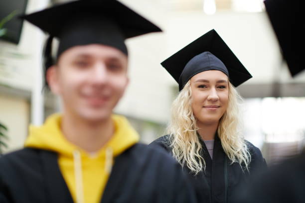 istock Group of diverse international graduating students celebrating 1310193168