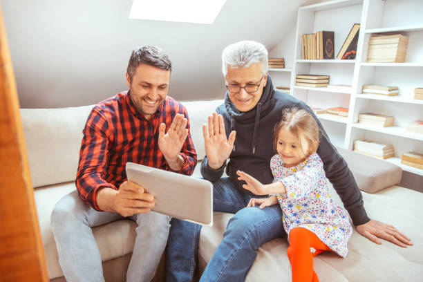 istock Grandfather, father and daughter spend time together 1310194791