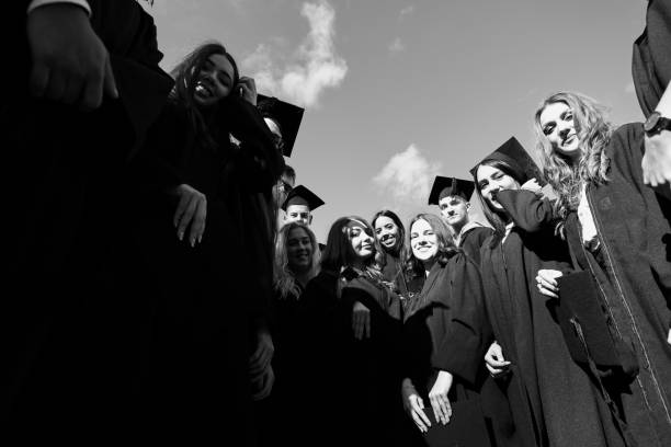 istock Group of diverse international graduating students celebrating 1310194952