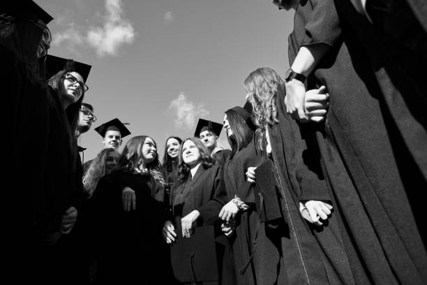istock Group of diverse international graduating students celebrating 1310195941