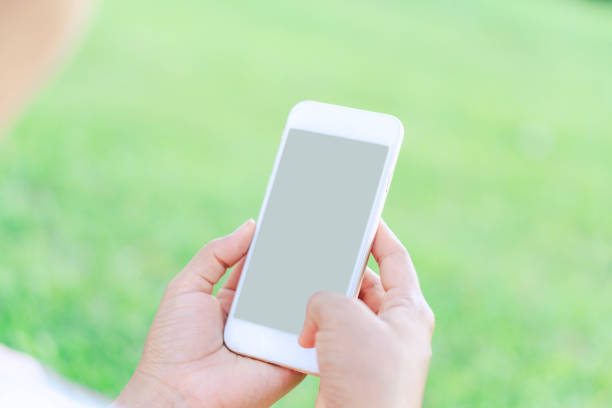 istock Closeup woman hand playing smartphone mobile with relaxing feelling, selective focus 1310205723