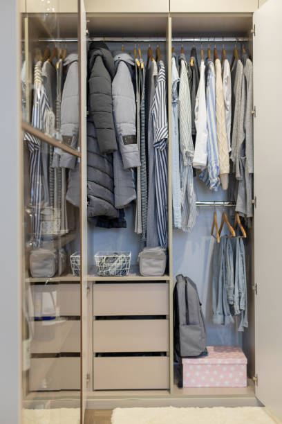 istock Wardrobe with perfect order clothes shades 1310205876