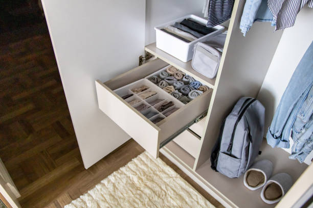 A very well organized wardrobe according to the Marie Kondo method Wardrobe and wardrobe organized according to the Japanese method of Mari Kondo. arrangement stock pictures, royalty-free photos & images