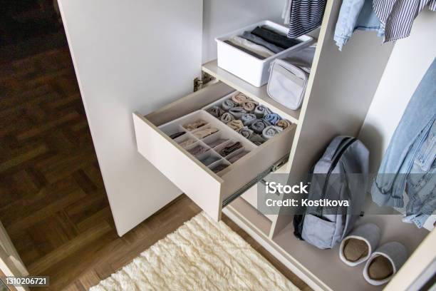 A Very Well Organized Wardrobe According To The Marie Kondo Method Stock Photo - Download Image Now