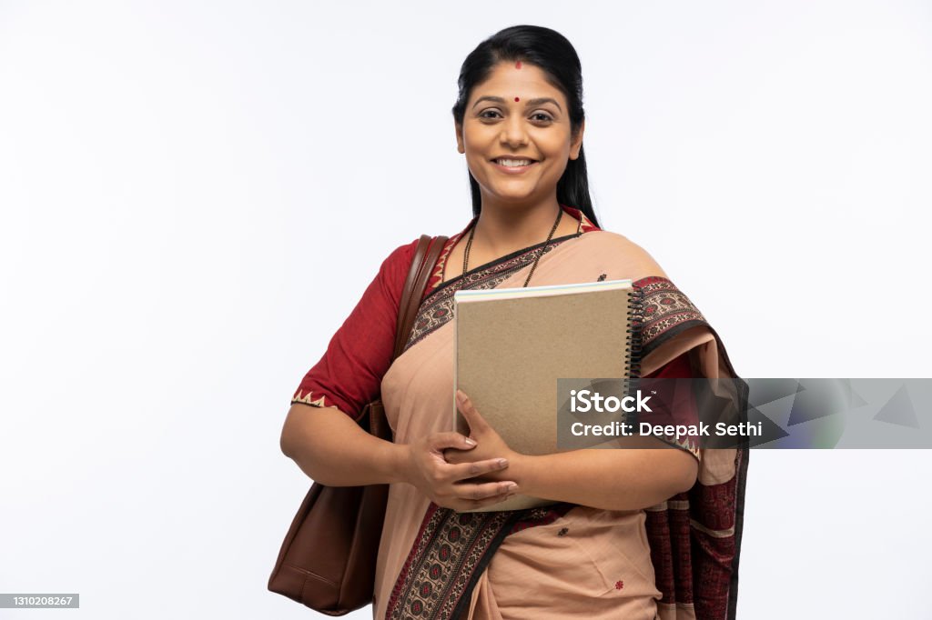Portrait of Indian woman as a teacher in sari standing isolated over white background:- stock photo Adult, adult only, teacher, middle class, India, Indian ethnicity, Teacher Stock Photo