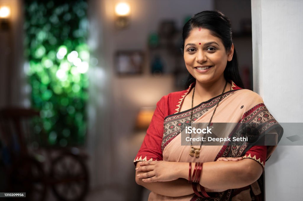 shot of a mid adult woman standing near window & balcony:- stock photo mid adult woman, standing , balcony, adult, adult only, India, Indian ethnicity, Indian Ethnicity Stock Photo