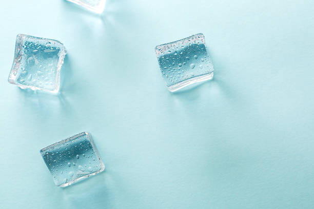 istock Abstract creative banner with ice cubes and water drops. 1310213095