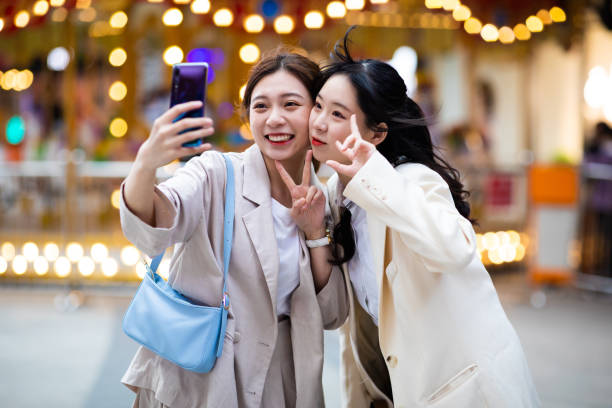 Taking selfie with friends