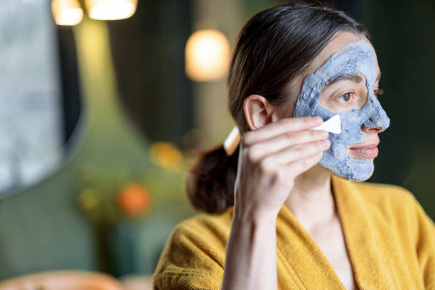 istock Woman applying bubble cleansing mask 1310216903