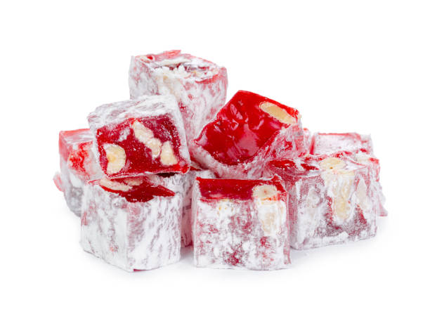 istock Close up of red Turkish Delight sweets isolated on white 1310216980