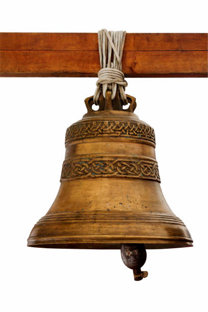 istock Decorative old church bell on a white background hanging on a beam. 1310217609