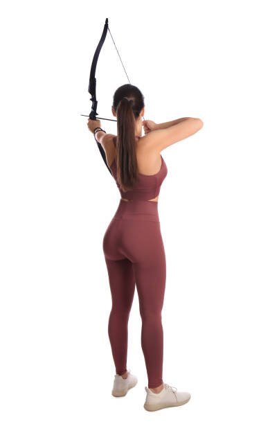 istock Woman with bow and arrow practicing archery on white background, back view 1310223051