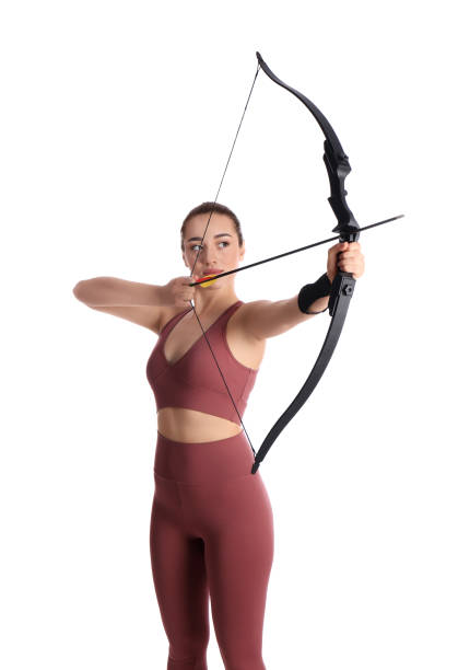 istock Woman with bow and arrow practicing archery on white background 1310223088