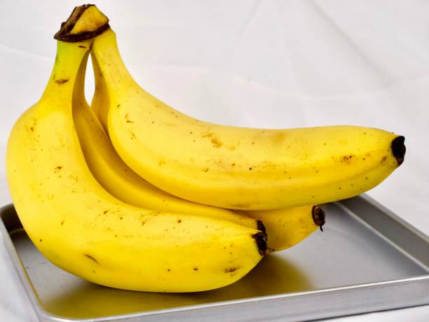 istock Yellow bananas on a steel tray 1310223762