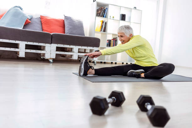 istock Mature Woman Exercise At Home 1310230670