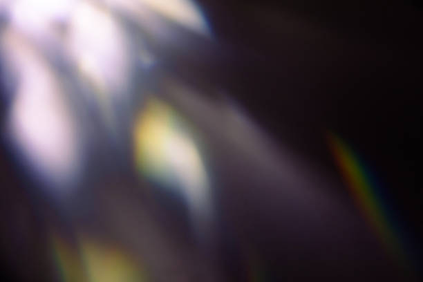 istock colorful warm rainbow light leaks on black background with dust texture 1310230944