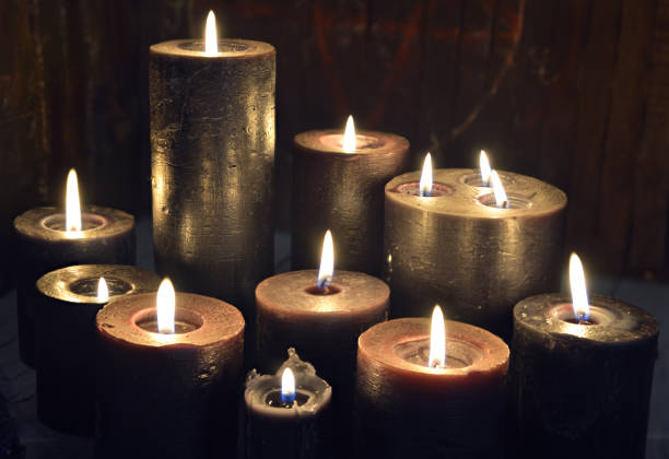 istock Still life with group of burning candles on witch altar. 1310233390