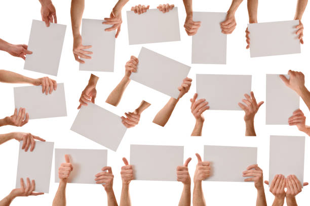 istock Set of two hands holding a white sheet a4 1310234022