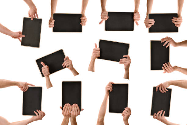 istock Collection catching blackboard with both hands white isolated background 1310234025