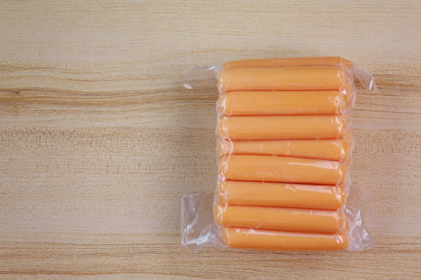 istock Top view a hot dog packages on wood table. 1310235542