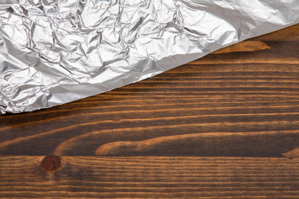 istock Food foil on a dark wooden table 1310243636