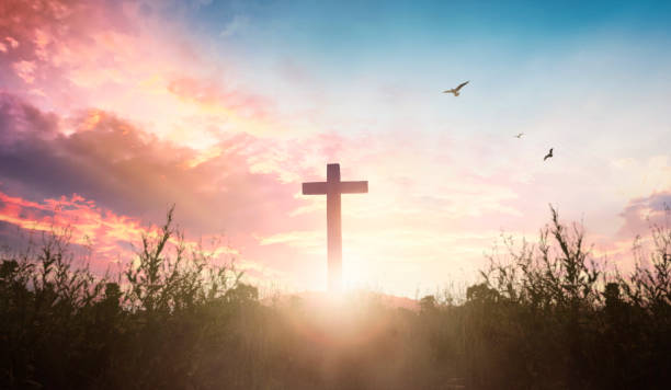 istock Easter concept: cross in the morning at sunrise 1310244306