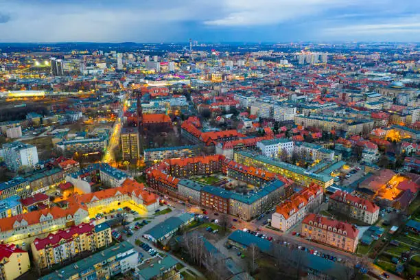 View from drone of Katowice cityscape at twilight in spring, Silesia Province, Poland