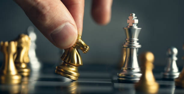 istock young business man playing chess 1310249269