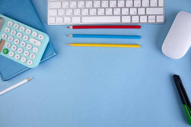 istock calculator on notebook with pencils and keyboard 1310249341