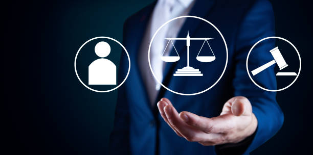 istock Lawyer hand a justice concept 1310249345