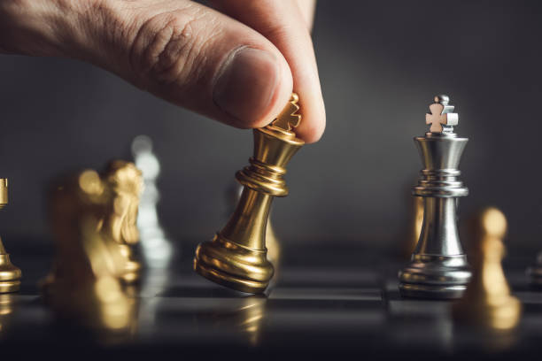 istock young business man playing chess 1310249386
