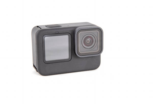 istock New 4K action camera in black color. Isolated white background 1310250084