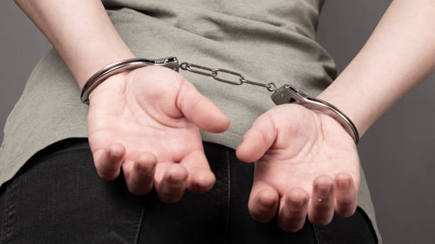 istock prisoner in handcuffs, arrested hands are handcuffed, close-up 1310252655