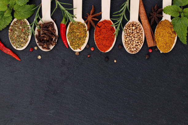 istock Various spices on dark background. Top view with copy space 1310252859