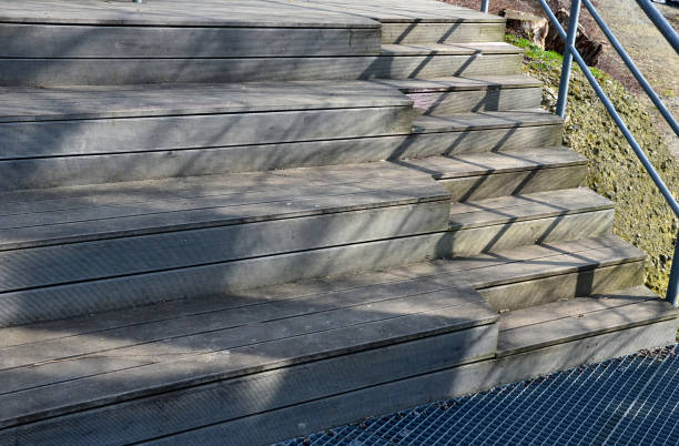 istock staircase construction with railing with high resistance to deformation and galvanized steel floor grate. wooden staircase which is the seating area of ​​the theater 1310254270
