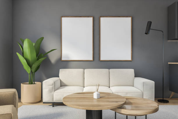 istock Mockup canvas in grey living room over white sofa with plant 1310255336
