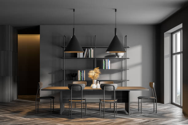 istock Gray and wooden dining room interior 1310256759
