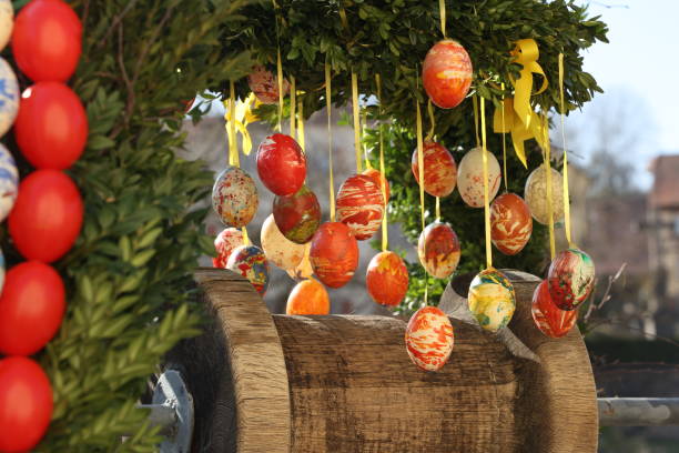 istock Colored decorative eggs are used to decorate wells in Germany for Easter 1310258049