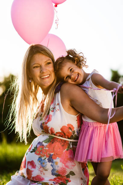 istock Pregnant mother and her daughter sharing love 1310259212