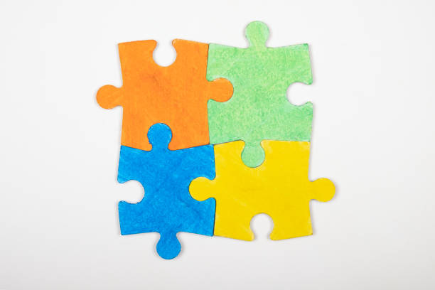 istock child autism symbol, colored puzzles, inclusive education 1310259994