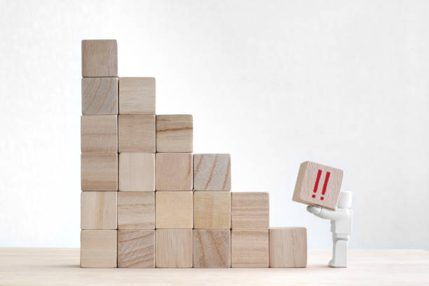 istock Wooden blocks and symbols 1310260275
