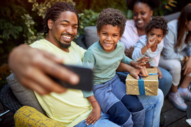 istock Father making selfie with family 1310261060